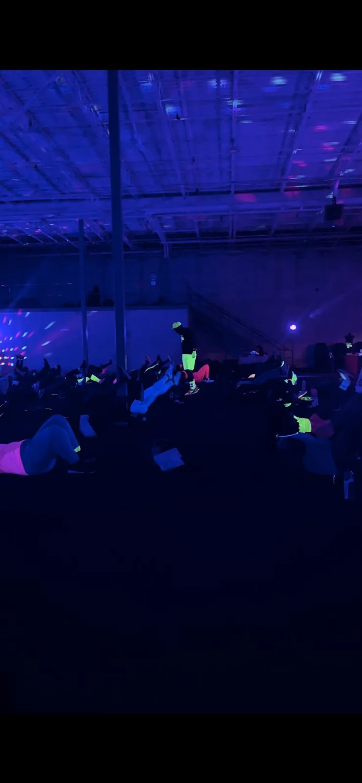 Trap Boxing Atlanta crowd under UV blacklights